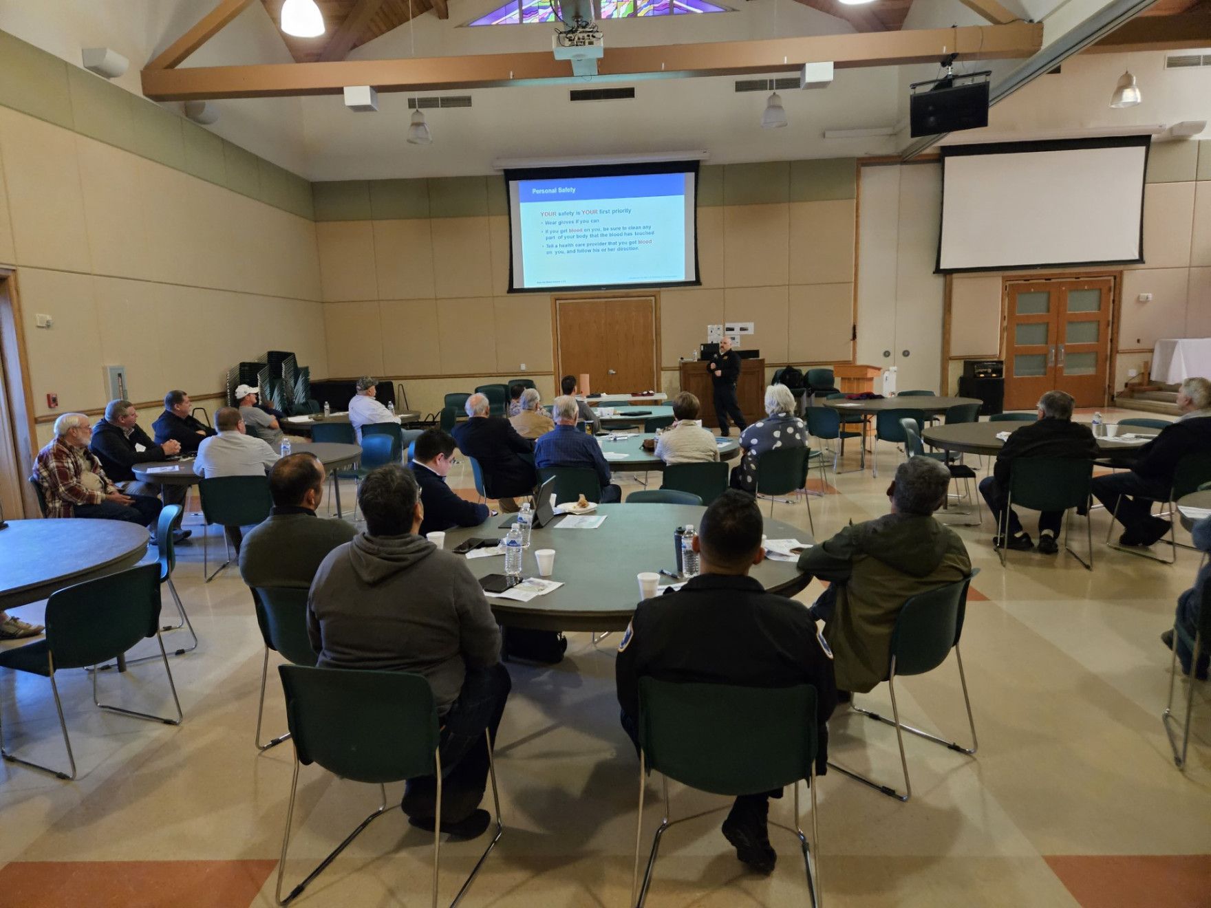 PHOWS attendees gathered in a meeting room